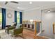 Upstairs living room featuring comfortable seating, stylish decor, and lots of natural light at 732 Province Se Pl, Atlanta, GA 30312