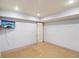 Finished basement featuring a TV and door leading to another room at 1426 Diamond Head Dr, Decatur, GA 30033