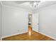 Simple bedroom featuring hardwood floors and neutral paint at 1426 Diamond Head Dr, Decatur, GA 30033