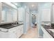 Bathroom featuring dual vanities with granite countertops and tile floors at 2140 Azalea Dr, Roswell, GA 30075