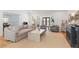 Cozy living room featuring hardwood floors and a seamless flow to other living spaces at 2140 Azalea Dr, Roswell, GA 30075