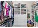 Organized walk-in closet with shelving, hanging rods, and drawers offering ample storage at 2140 Azalea Dr, Roswell, GA 30075