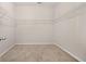 Walk-in closet equipped with wire shelving, ready for organization and storage at 498 Charleston Pl, Villa Rica, GA 30180