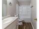 Clean bathroom featuring a shower-tub combo, a toilet, and a single sink at 67 Jennifer Ln, Rydal, GA 30171