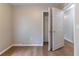 Bedroom with modern flooring, open closet, and neutral color palette at 67 Jennifer Ln, Rydal, GA 30171