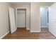 Bright bedroom with modern flooring and open closet space at 67 Jennifer Ln, Rydal, GA 30171