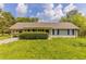 Charming single-story home with a covered carport and a well-maintained lawn and landscaping at 67 Jennifer Ln, Rydal, GA 30171