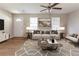 Staged living room with a modern sofa set and decorative lighting and interior design at 67 Jennifer Ln, Rydal, GA 30171