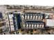 Aerial view of townhomes showcasing rooftop patios and the surrounding neighborhood streets at 726 Edgewood Ne Ave, Atlanta, GA 30307