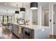 Contemporary kitchen with a center island and modern fixtures at 726 Edgewood Ne Ave, Atlanta, GA 30307