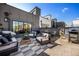Stylish rooftop patio with comfortable seating, dining area, and outdoor grill; perfect for entertaining and relaxing at 726 Edgewood Ne Ave, Atlanta, GA 30307