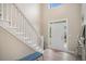 Inviting foyer with a staircase, high ceilings, and plenty of natural light, setting an elegant tone at 113 Glenmore Ln, Mcdonough, GA 30253