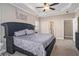 Spacious main bedroom with tray ceilings and ensuite bathroom at 113 Glenmore Ln, Mcdonough, GA 30253