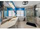 Luxurious bathroom with soaking tub, a glass shower, and a double sink vanity at 1703 Brandywine Ct, Atlanta, GA 30338