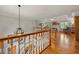 Open foyer with hardwood floors leading to a large living space with fireplace and abundant light at 1703 Brandywine Ct, Atlanta, GA 30338