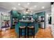 Modern kitchen with granite countertops, stainless steel appliances, and breakfast bar at 1703 Brandywine Ct, Atlanta, GA 30338