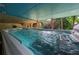 Covered in-ground pool featuring clear water and a comfortable temperature at 1703 Brandywine Ct, Atlanta, GA 30338