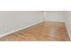 Spacious basement featuring wood-look flooring and clean, neutral-colored walls at 1819 Laurel Ridge Sw Dr, Conyers, GA 30094