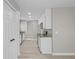 Well-lit kitchen features modern appliances, granite countertops, and stylish cabinets at 1819 Laurel Ridge Sw Dr, Conyers, GA 30094