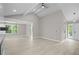 Open-concept living room with vaulted ceilings and abundant natural light at 1819 Laurel Ridge Sw Dr, Conyers, GA 30094