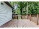 Exterior shot of the backyard wooden deck perfect for entertaining at 2174 Beecher Sw Rd, Atlanta, GA 30311
