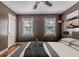 Cozy bedroom with neutral wall color, hardwood floors and plenty of natural light at 2174 Beecher Sw Rd, Atlanta, GA 30311