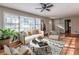 Cozy living room with hardwood floors, neutral colors, and plenty of seating for guests at 2174 Beecher Sw Rd, Atlanta, GA 30311