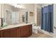 Bathroom features vanity with granite countertop and a bathtub-shower combo at 803 Brookhavenrun Cir, Duluth, GA 30097