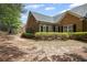 Beautiful exterior of a brick and stone home with a well-manicured lawn at 803 Brookhavenrun Cir, Duluth, GA 30097