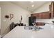 Modern kitchen with granite countertops, stainless steel sink, and plenty of cabinet space at 803 Brookhavenrun Cir, Duluth, GA 30097
