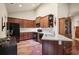 Cozy kitchen featuring wood cabinets, tile backsplash, and stainless steel appliances at 803 Brookhavenrun Cir, Duluth, GA 30097
