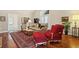 Comfortable living room with hardwood floors, area rug, and cozy seating at 803 Brookhavenrun Cir, Duluth, GA 30097