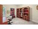 Office with built-in bookshelves and plenty of natural light at 803 Brookhavenrun Cir, Duluth, GA 30097