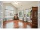 Bright and airy office space with hardwood floors and large windows providing great natural light at 803 Brookhavenrun Cir, Duluth, GA 30097