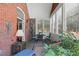 Enclosed patio with brick and stone decor, great for relaxing at 803 Brookhavenrun Cir, Duluth, GA 30097