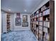 Basement media room with custom built-in shelving for storage at 1257 Independence Way, Marietta, GA 30062