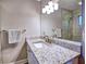 Bathroom featuring granite countertops, a sink, and a shower with glass doors at 1257 Independence Way, Marietta, GA 30062