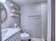 Modern half bath featuring a sleek sink and decorative shelving at 1257 Independence Way, Marietta, GA 30062