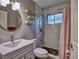 Modern bathroom with sleek vanity, updated shower, and stylish mirror at 1257 Independence Way, Marietta, GA 30062