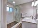Modern bathroom with glass-enclosed shower and granite countertop at 1257 Independence Way, Marietta, GA 30062