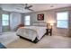 Bright bedroom with plush carpeting and large windows at 1257 Independence Way, Marietta, GA 30062