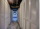 Hallway lined with closet doors, providing ample storage space at 1257 Independence Way, Marietta, GA 30062
