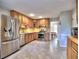 Spacious kitchen with stainless steel appliances and tile flooring at 1257 Independence Way, Marietta, GA 30062