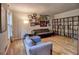 Comfortable living room featuring hardwood floors, neutral walls and decor, and built-in shelving at 1257 Independence Way, Marietta, GA 30062