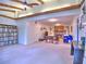 Open-concept living room with exposed beams and a brick fireplace at 1257 Independence Way, Marietta, GA 30062
