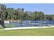 Community tennis courts with surrounding trees and seating, providing a great space for recreation and socializing at 1257 Independence Way, Marietta, GA 30062