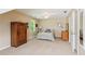 Comfortable bedroom with a ceiling fan, natural light, and neutral carpet and paint at 1405 Arden Trace Ln, Lawrenceville, GA 30043