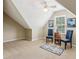 Sitting area with a dormer window, two chairs, and neutral carpet and paint at 1405 Arden Trace Ln, Lawrenceville, GA 30043