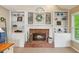 Cozy brick fireplace with built-in shelving units at 1405 Arden Trace Ln, Lawrenceville, GA 30043