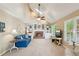 Bright living room with vaulted ceilings, fireplace, and built-in bookshelves at 1405 Arden Trace Ln, Lawrenceville, GA 30043